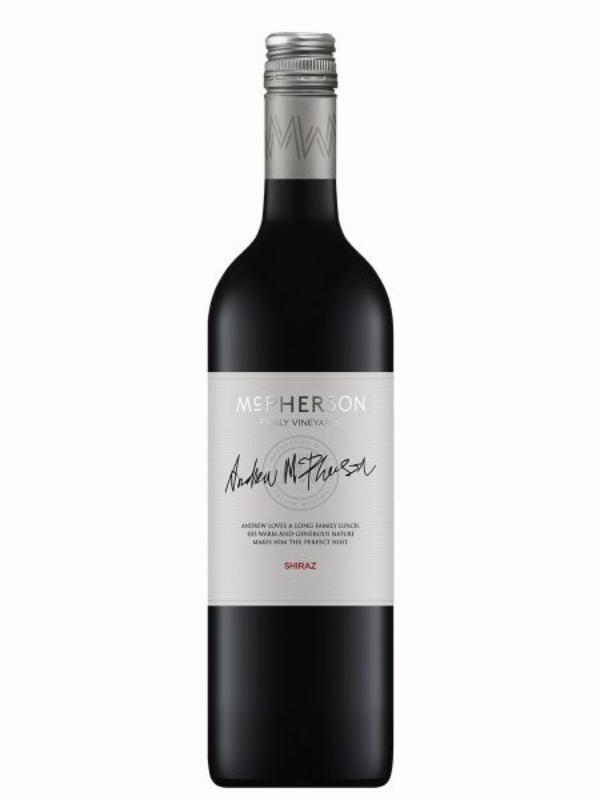 Tall dark green glass bottle of McPherson Shiraz with a minimalist white label displaying